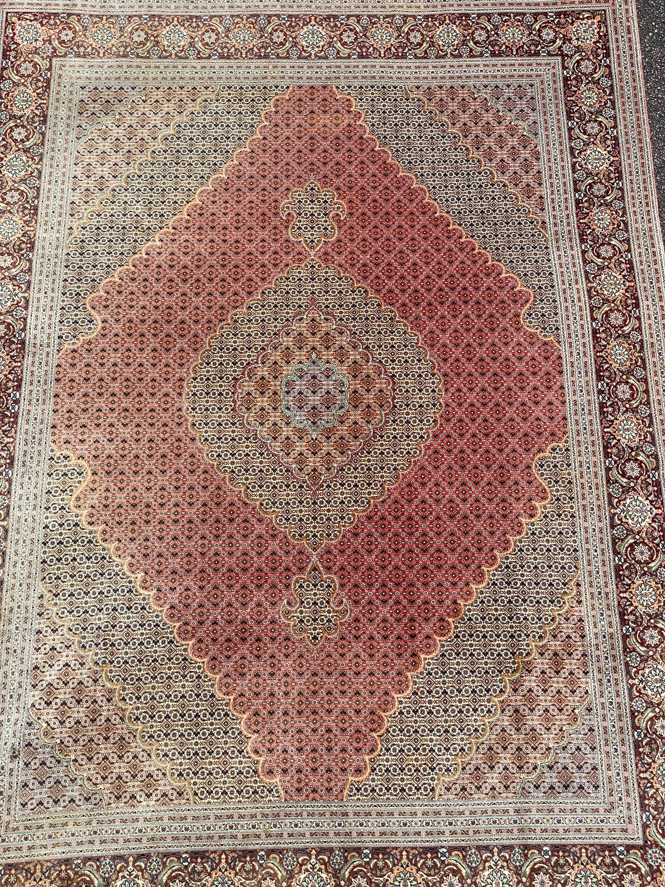 A Persian part silk Tabriz carpet, 350 x 248cm